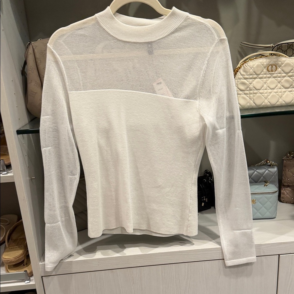 Elegant White Sheer Panel Top
Aqua